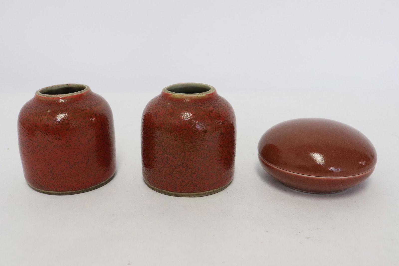 3 red glazed porcelain pieces (1 of 10)