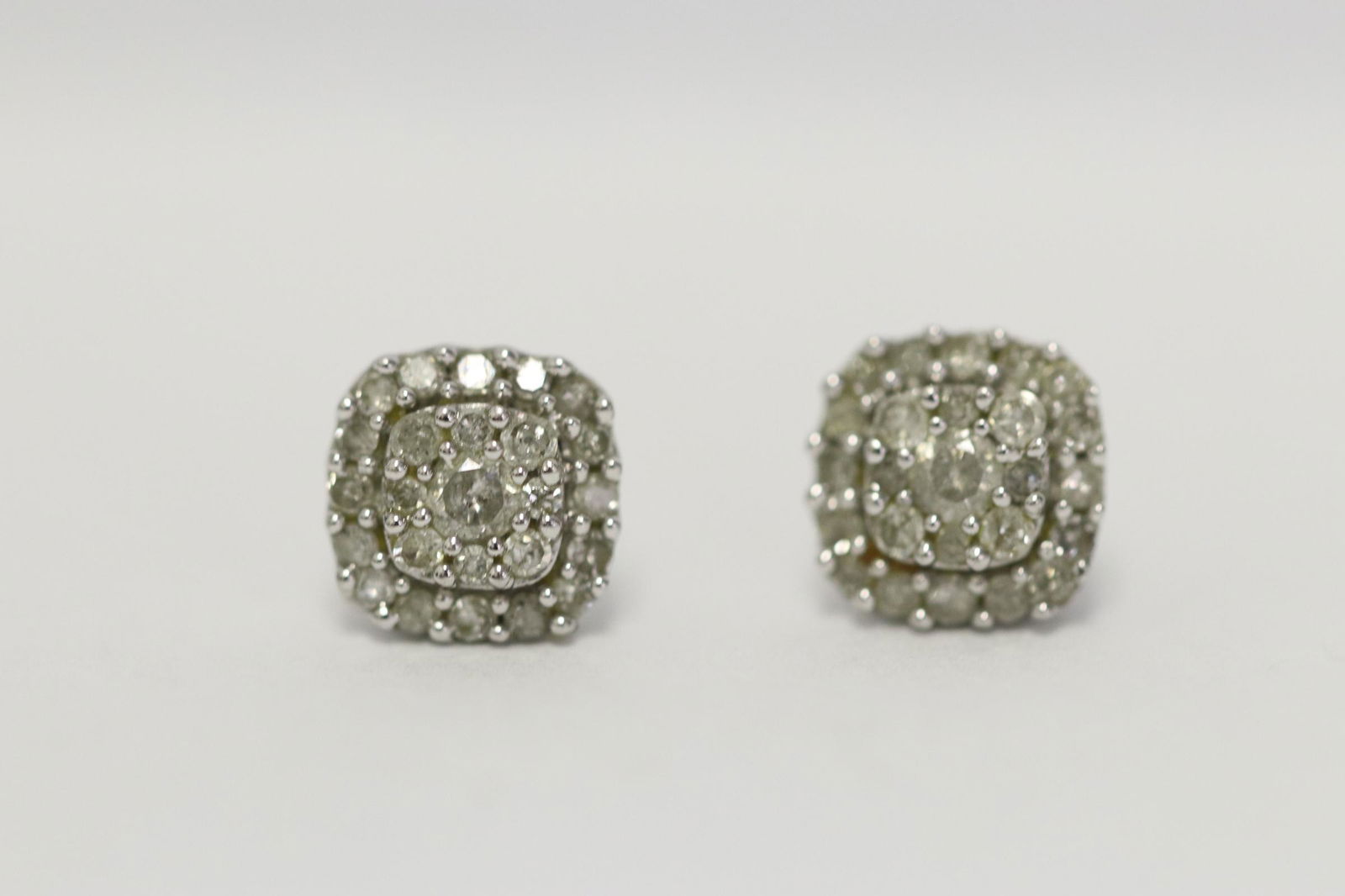 Pair 14K W/G diamond earrings (1 of 6)