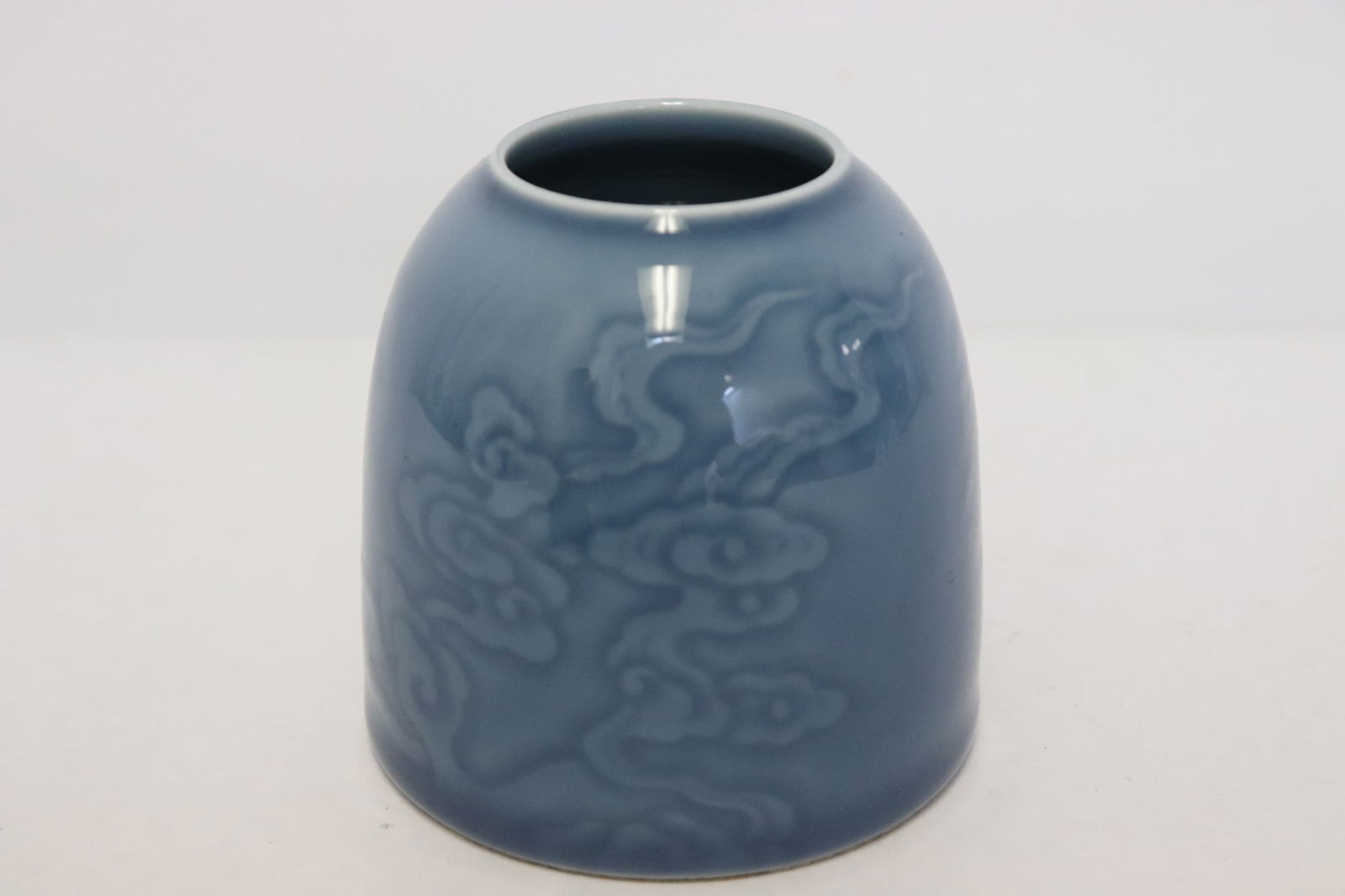 A blue glazed porcelain water dripper (1 of 6)