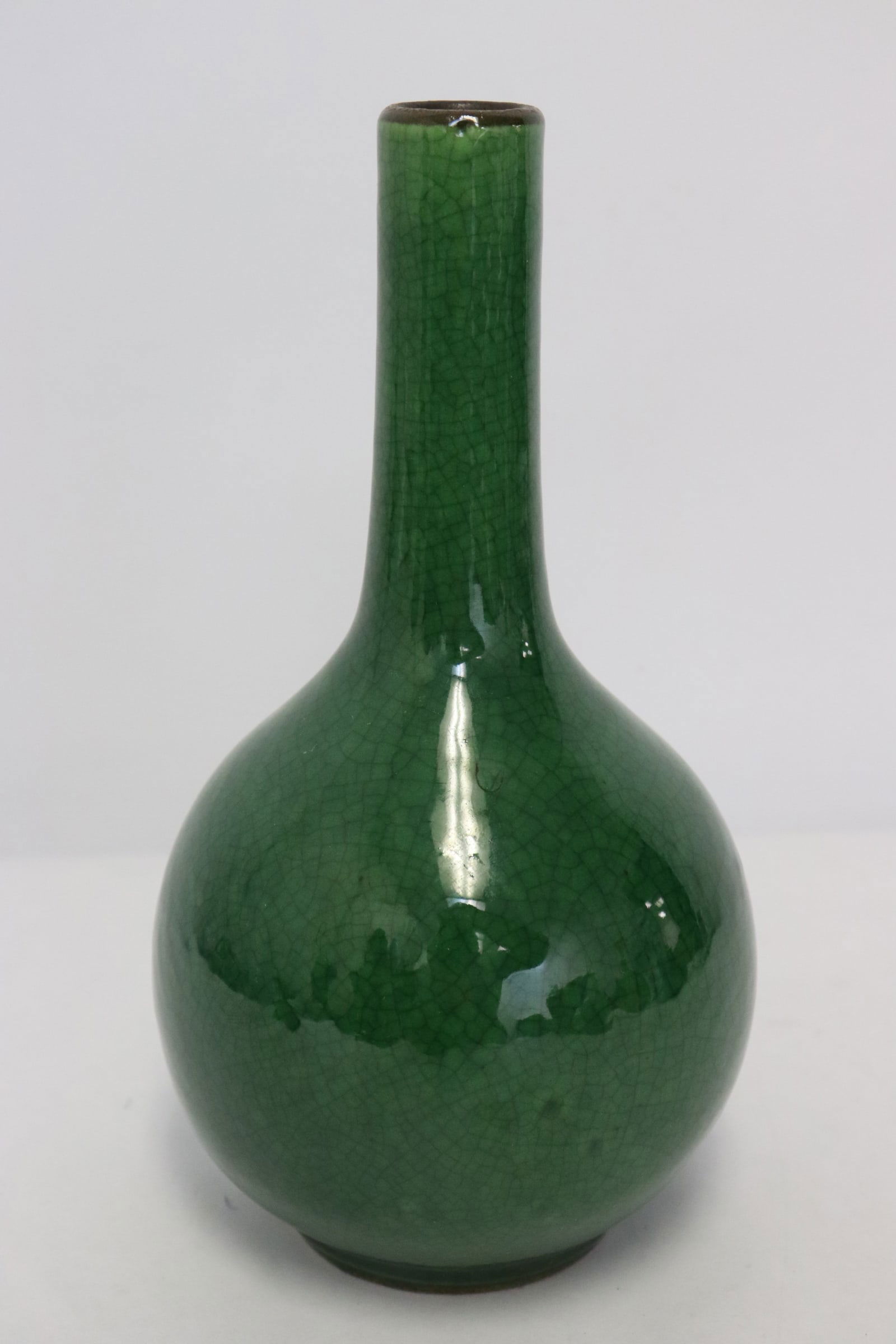 A green glazed porcelain bottle vase (1 of 9)