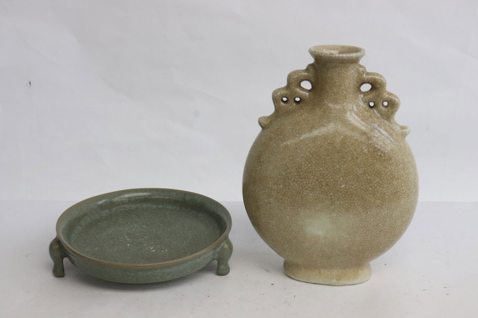 a crackleware flask, and a crackleware brush wash: 2 pieces; a crackleware flask (6.65"x5"x2.4"), and a crackleware brush wash (1.3"x5.35"x5.35")