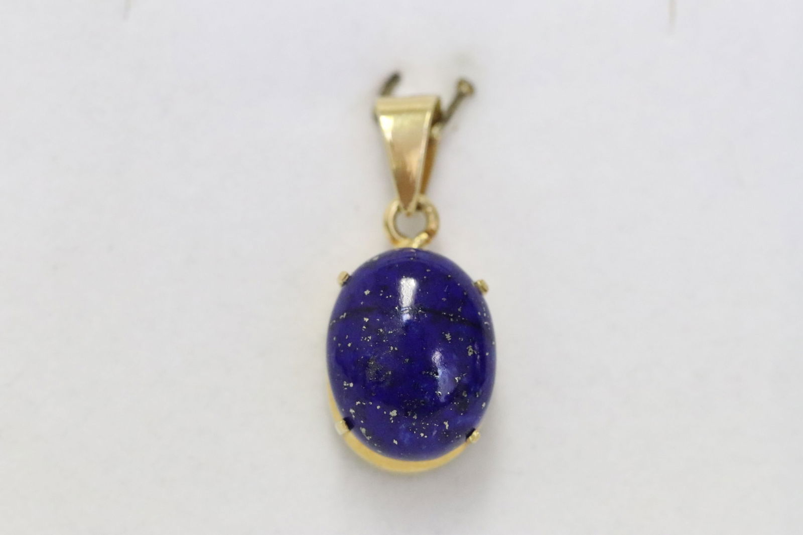 An 18K Y/G lapis pendant (1 of 8)