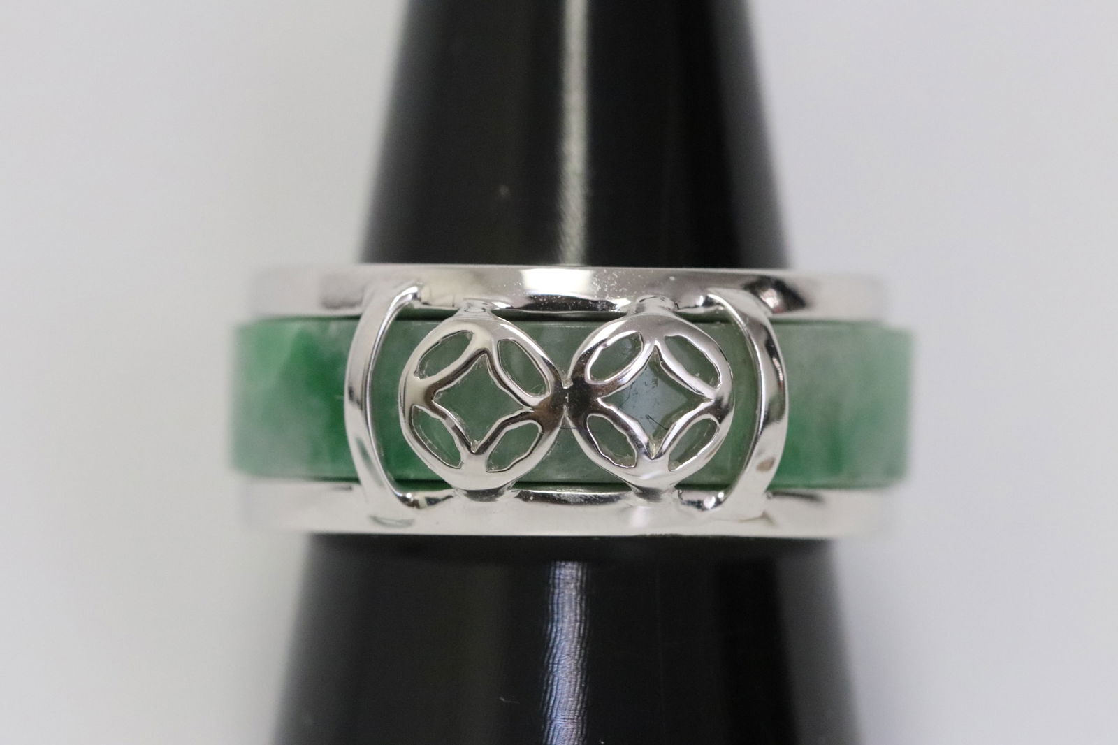 18K W/G jadeite eternity band with GIA certificate: An 18K W/G natural apple green color jadeite eternity band (size 8), accented with 2 rows of small diamonds, jadeite hairline, wt. 11.2gm, with GIA certificate
