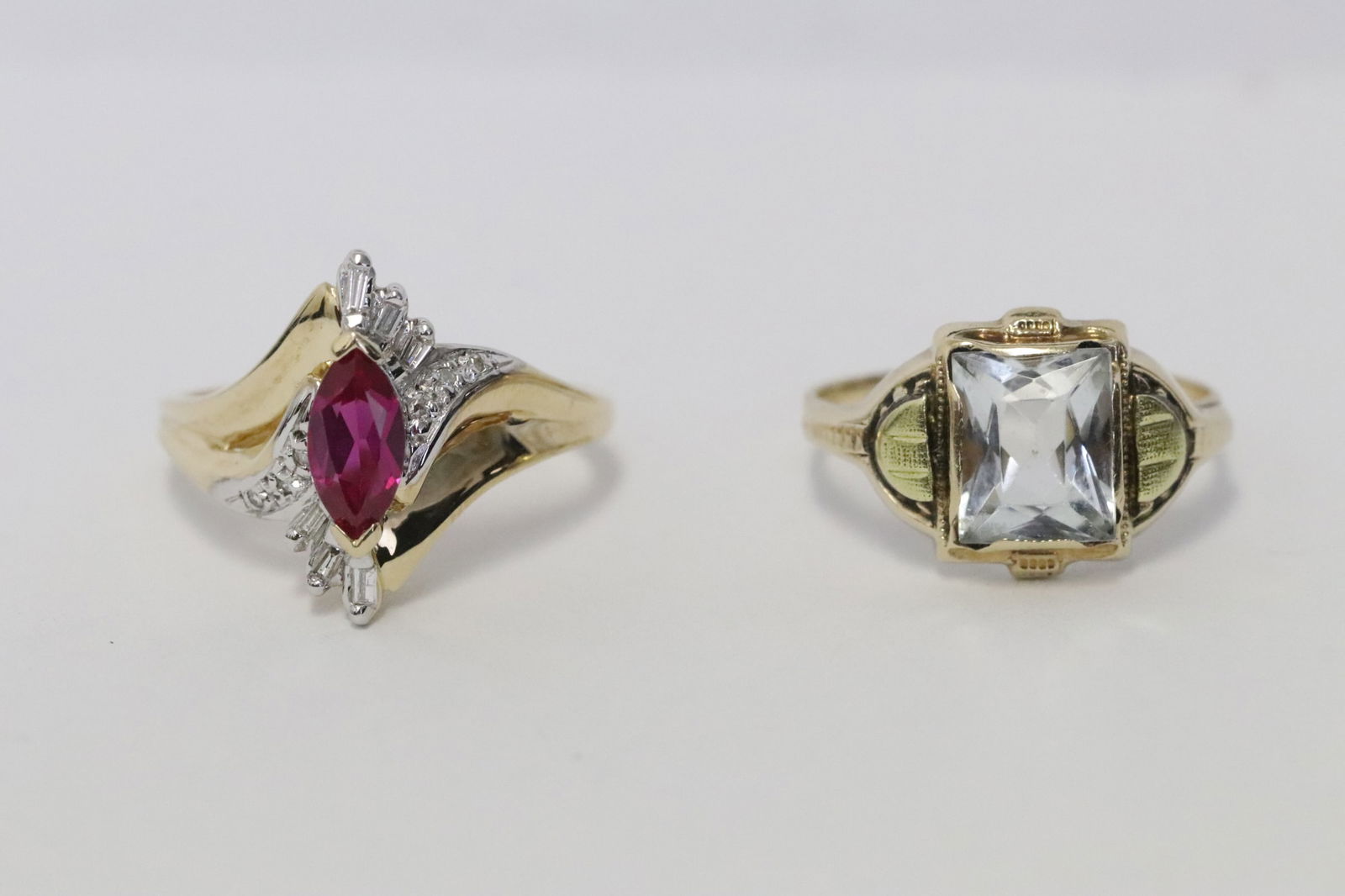 Two 10K rings; one w/ red stone, one w/ blue stone (1 of 10)
