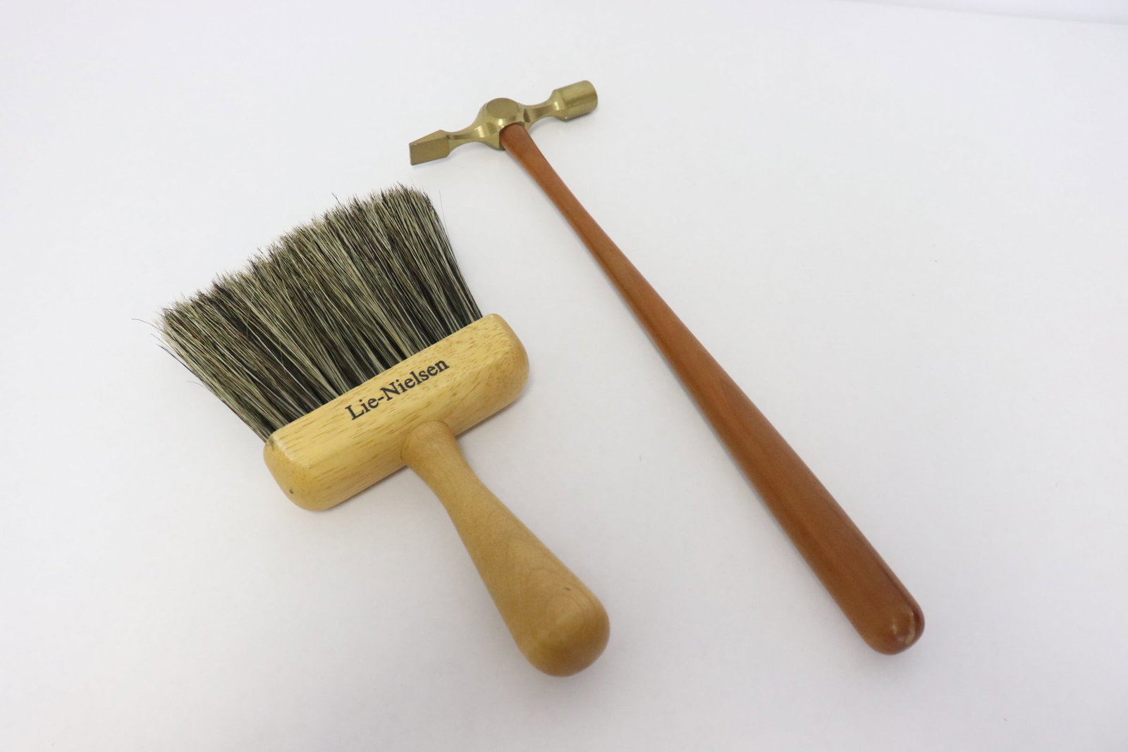 2 Lie-Nielsen pieces: 2 pieces; a Lie-Nielsen cross-peen hammer (11.9"L), and a Lie-Nielsen dusting brush (8.25"L)