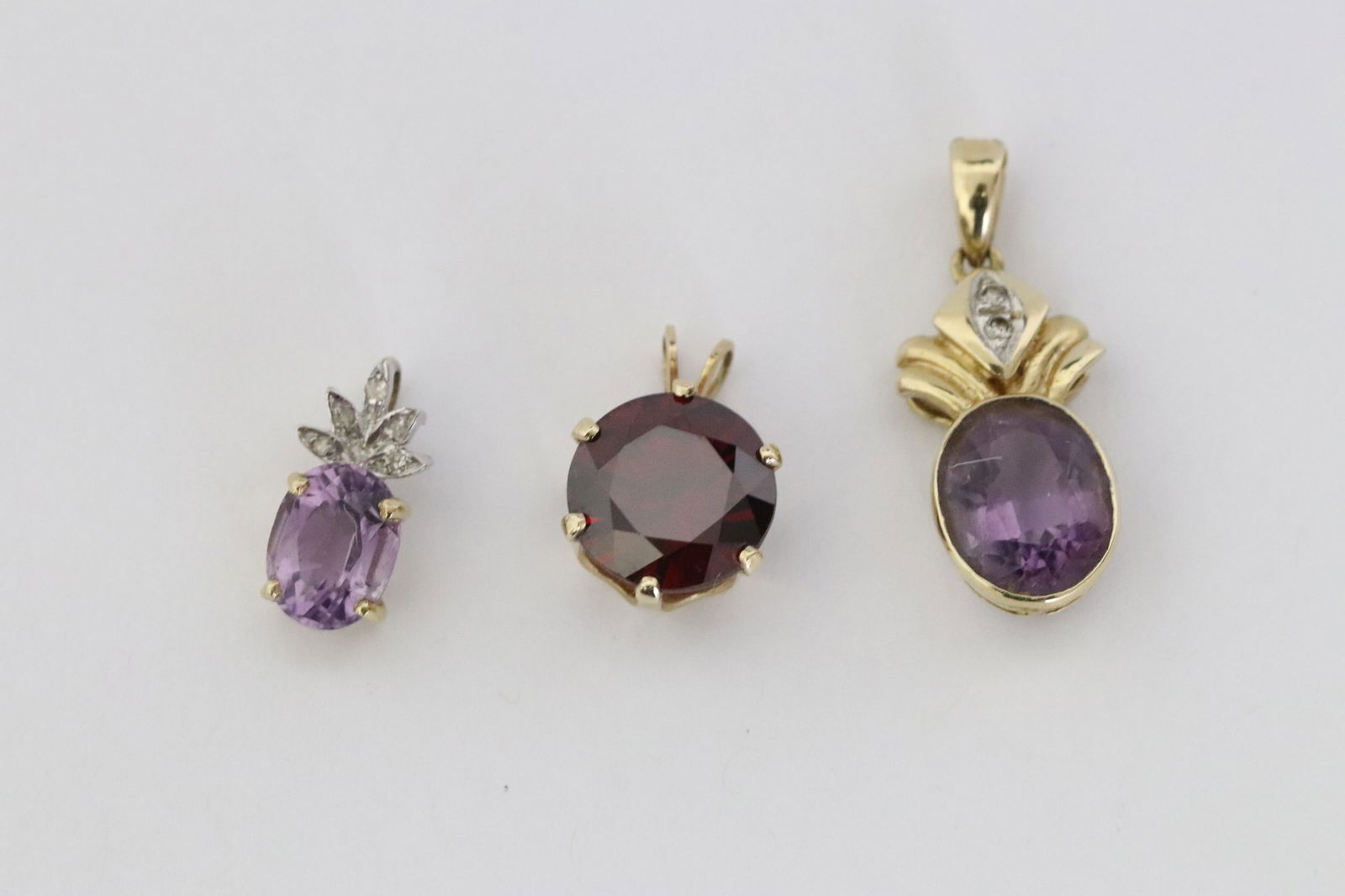 Three 14K Y/G pendants with stones (1 of 10)