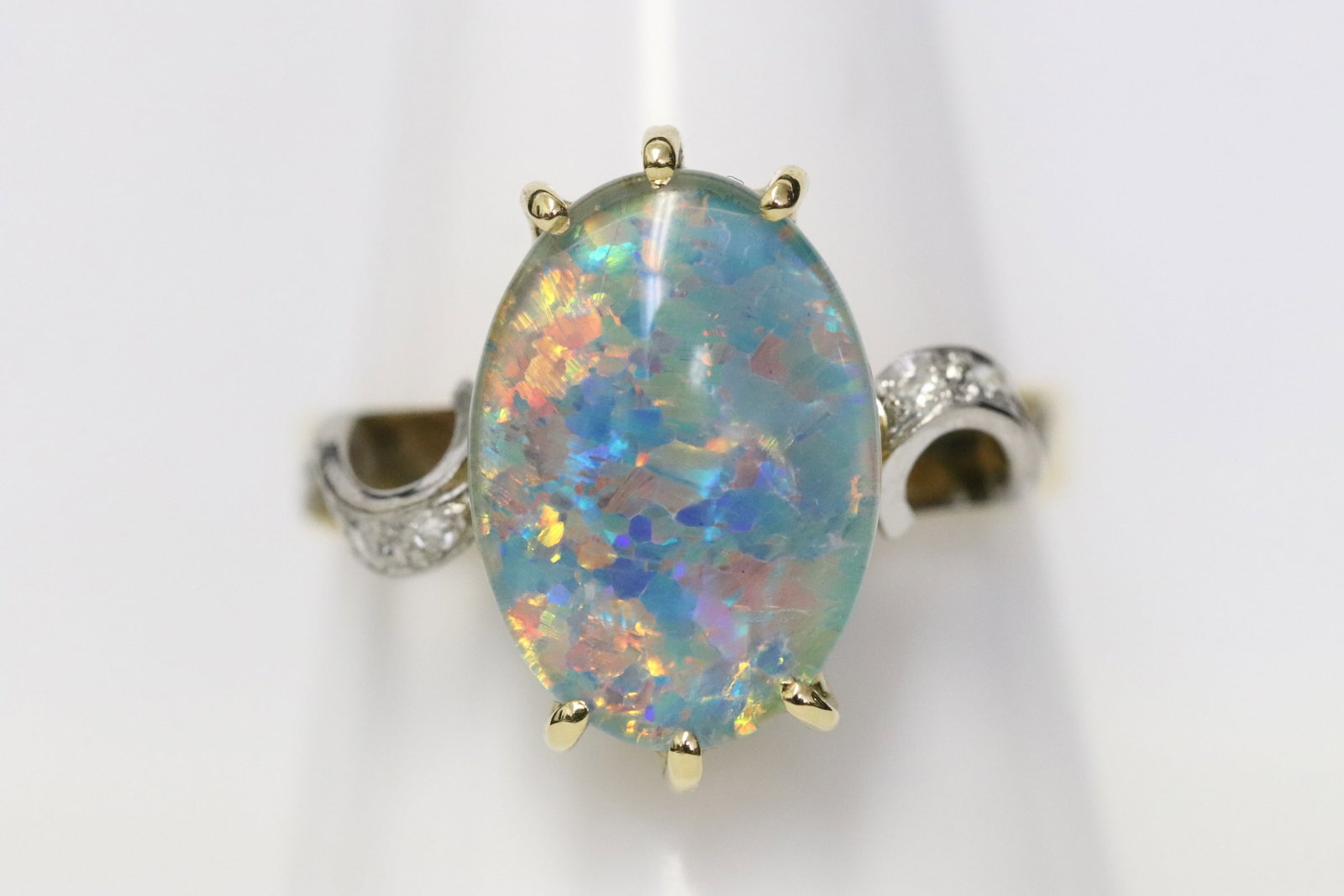 18K Y/G ring set with one oval opal like stone (1 of 9)