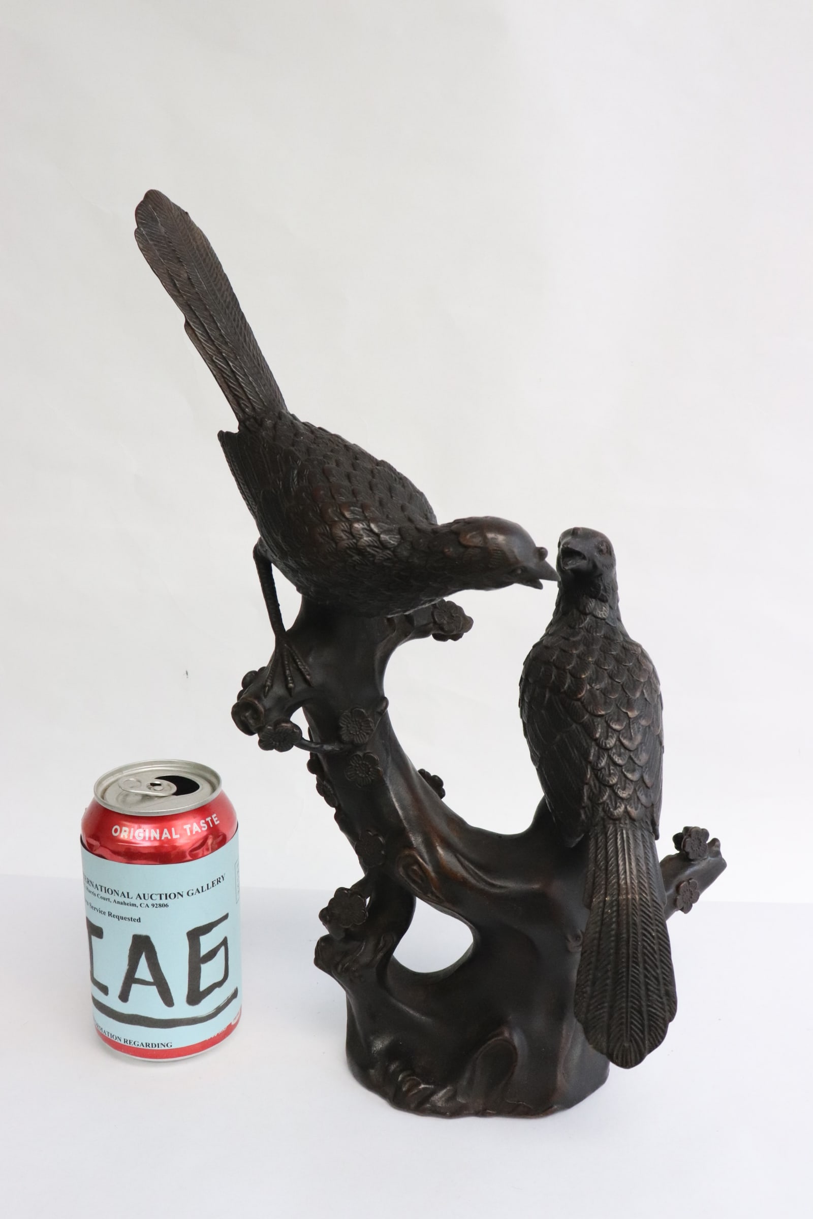 bronze sculpture depicting birds on tree branch (1 of 7)