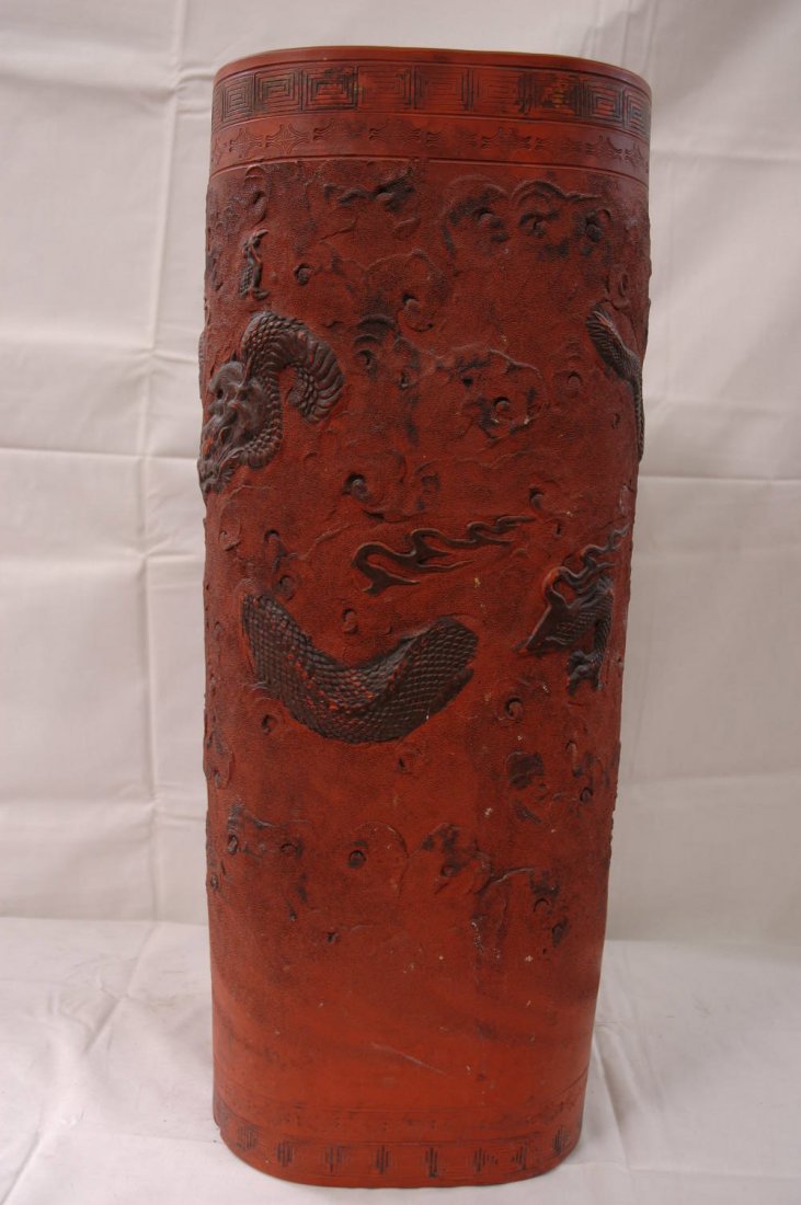 Early 20th century Japanese Yixing vase: An early 20th century Japanese imitation of Chinese Yixing clay stoneware of square vase, decorated with dragon in and out cloud. The bottom mark "qing shui gong chang" (24"Hx9.5"Wx9.5"D)