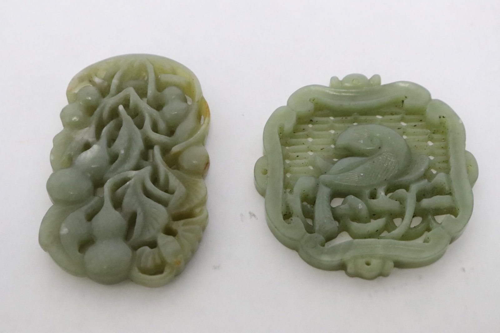2 Chinese celadon jade carved ornaments: 2 Chinese celadon jade carved ornaments, 0.2"x2.1"x2.15", 0.38"x2.65"x1.5"