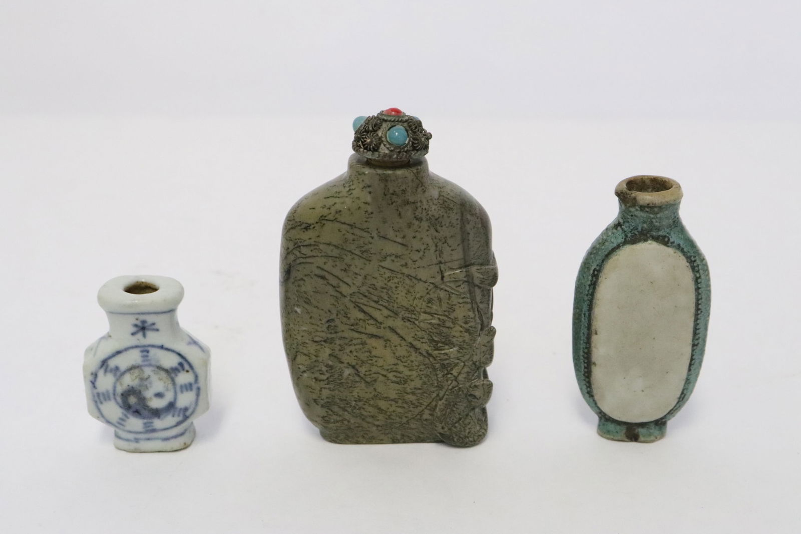 A stone carved snuff bottle, & 2 porcelain snuff bottles (1 of 11)