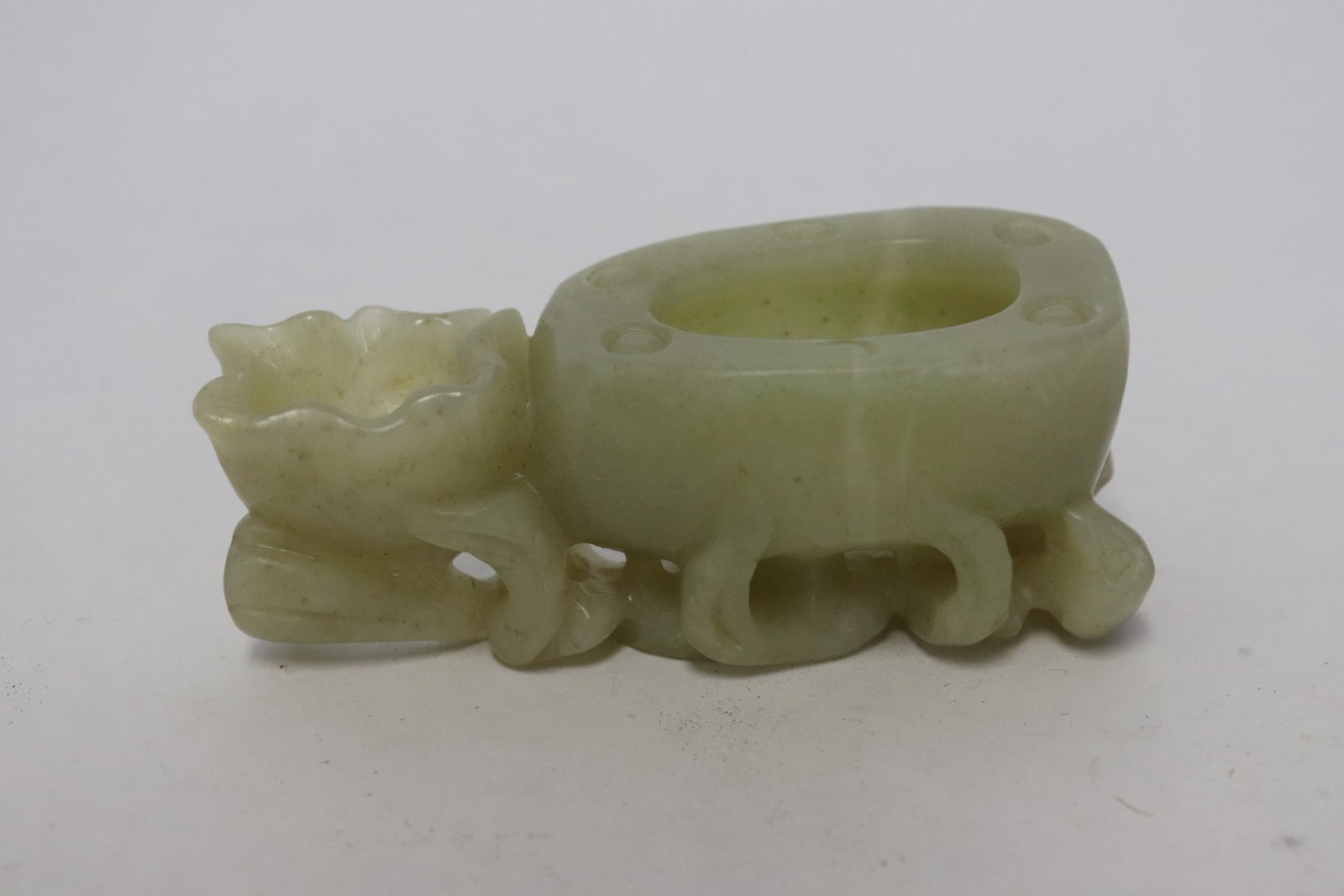Celadon jade carved water dripper: Celadon jade carved water dripper, 1.3"x3.45"x1.3"