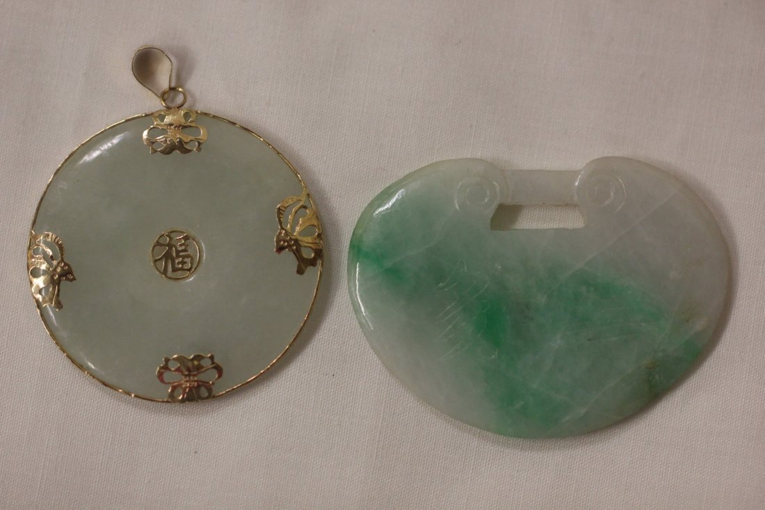 Chinese jadeite carved locket, & a Chinese jadeite: Chinese jadeite carved locket (1.7"x1.4"), one side engraved with sanduo and the other side engraved with jiuru, and a Chinese jadeite pei with 14K bezel and 14K finale