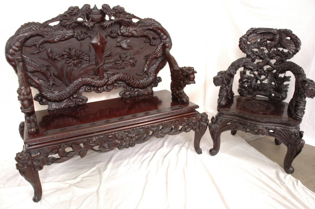 Chinese rosewood loveseat, & matching armchair: Chinese rosewood loveseat (47"Hx55"x23.5"), and matching armchair (40"Hx28"x22") carved with dragons