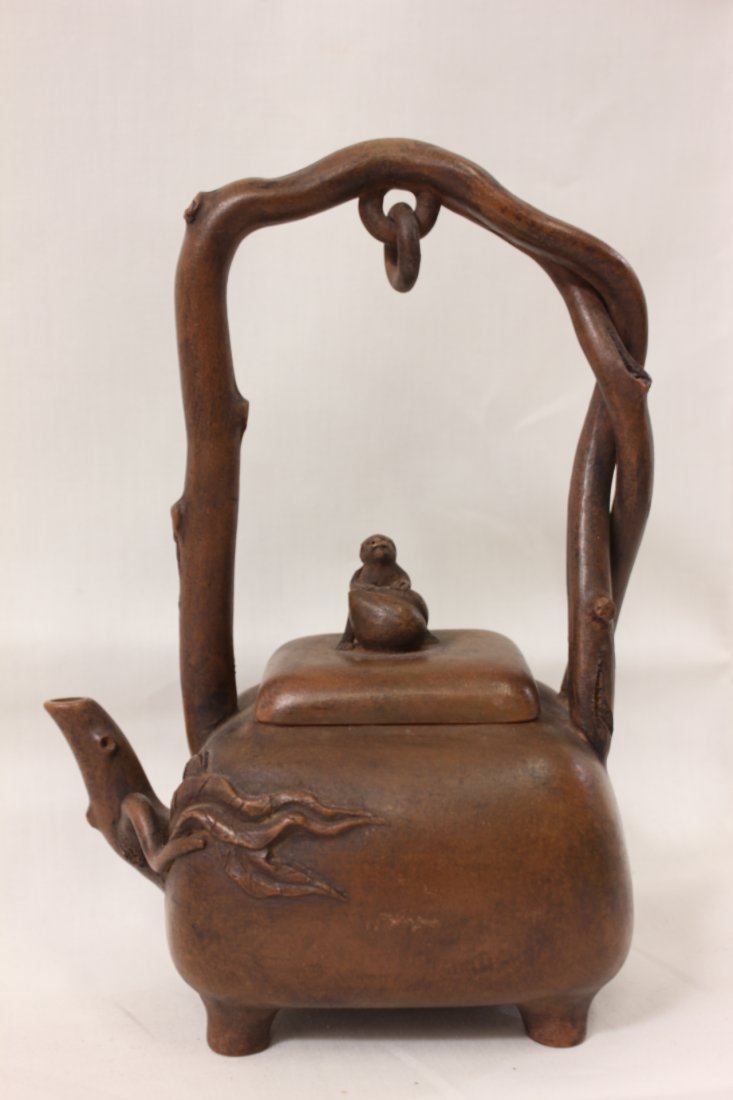 Chinese Yixing clay teapot: Chinese Yixing clay teapot with monkey motif finale(8.5"Hx5.6"x4")