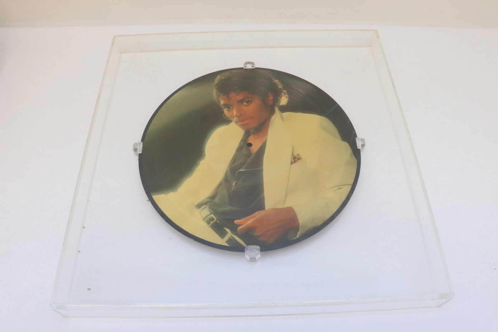 A pictorial record of thriller framed in Lucite case: A pictorial record of thriller framed in Lucite case