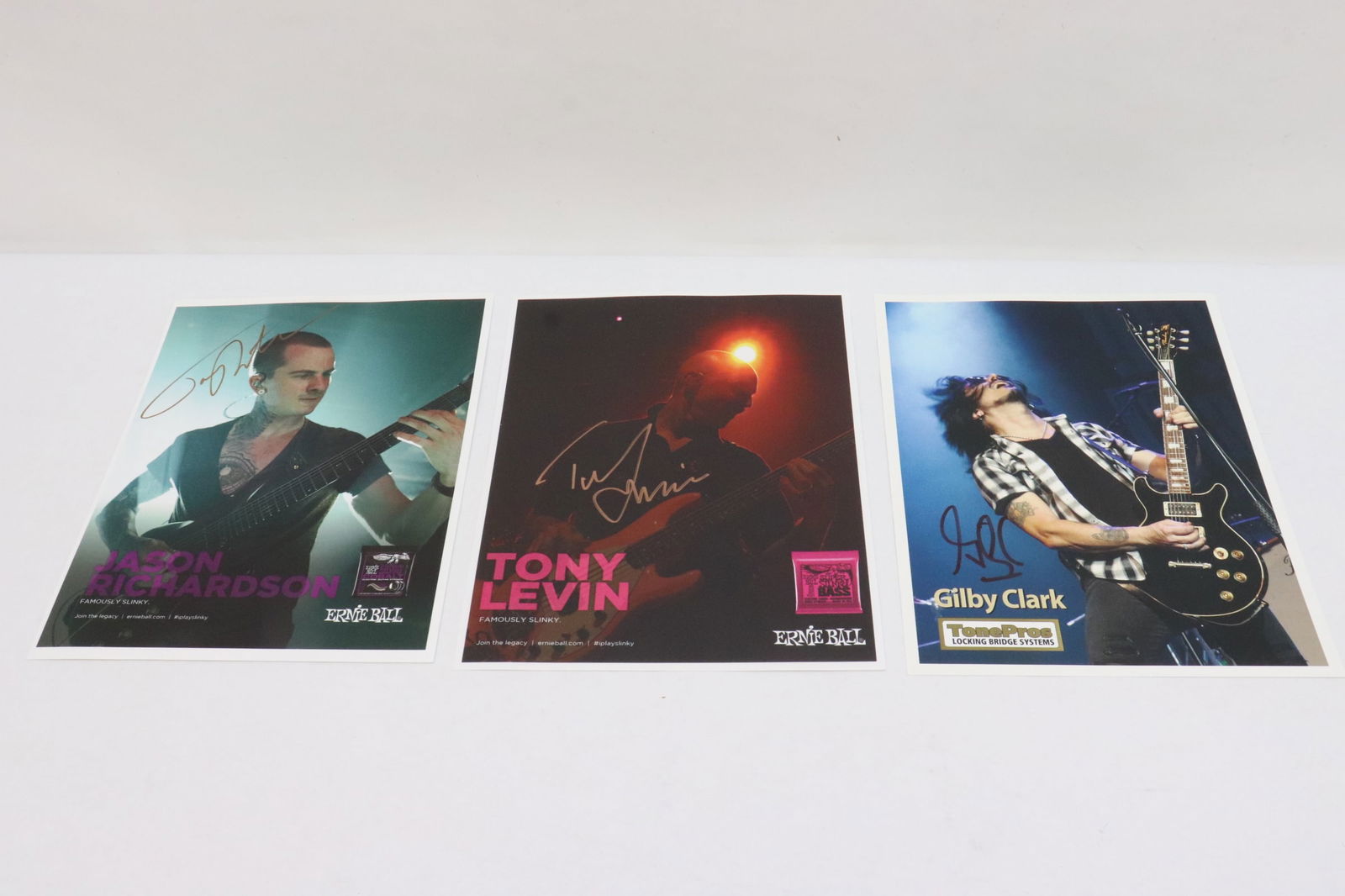 3 signed photos of Rock band members (1 of 7)