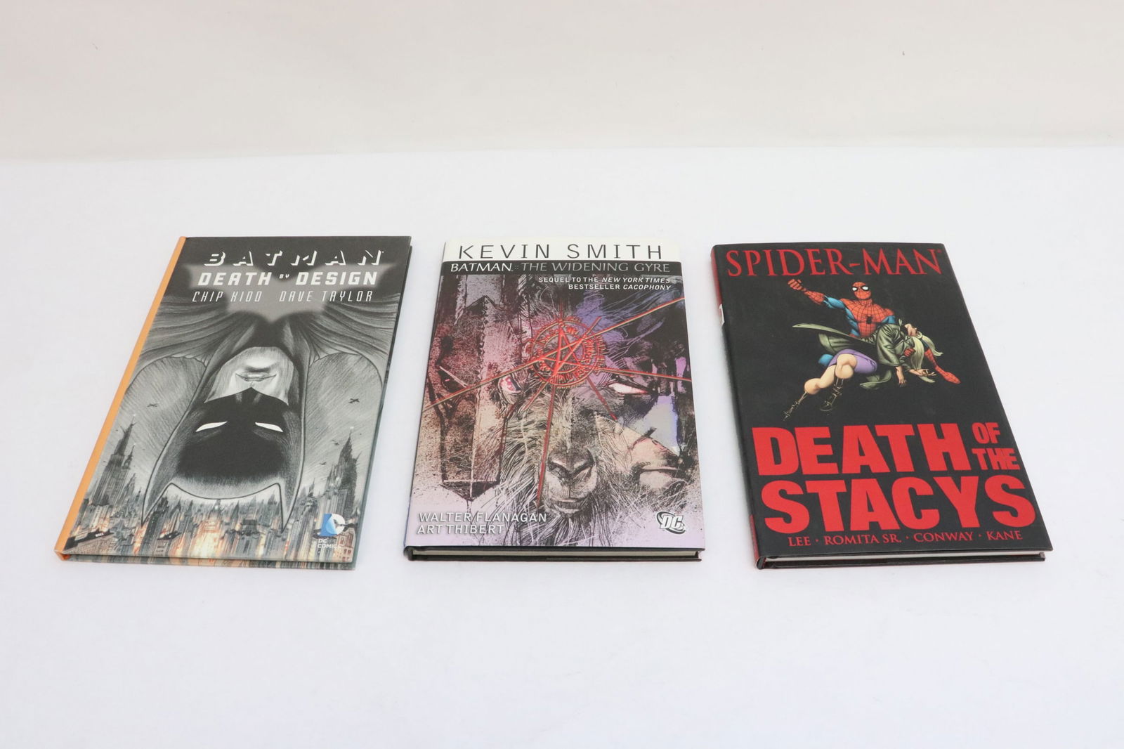 3 comic books: 3 comic books; "Spider man, death of the Stacys", "Batman, the widening Gyre", and "Batman, death by design", all in excellent condition