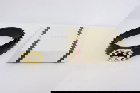 A Gucci leather belt: A Gucci leather belt