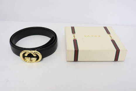 A Gucci leather belt: A Gucci leather belt