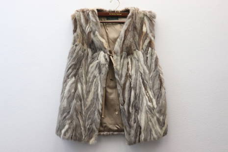 Very rare lynx/ leopard fur vest: Very rare lynx/ leopard fur vest by Turck Pels Danish Furs, 28"L, cross back (shoulder to shoulder): 14"L