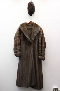 oversized full length mink coat by Carmen Effenson: An oversized full length mink coat by Carmen Effenson, 56"L, cross back (shoulder to shoulder): 18"L