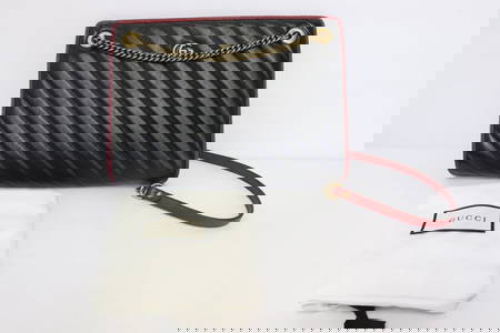 A Gucci GG Marmont accordion shoulder bag