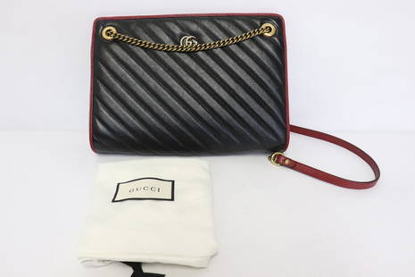 A Gucci GG Marmont accordion shoulder bag: A Gucci GG Marmont accordion shoulder bag (1.9"x11"x8") with diagonal quilt leather in as new condition with dust bag