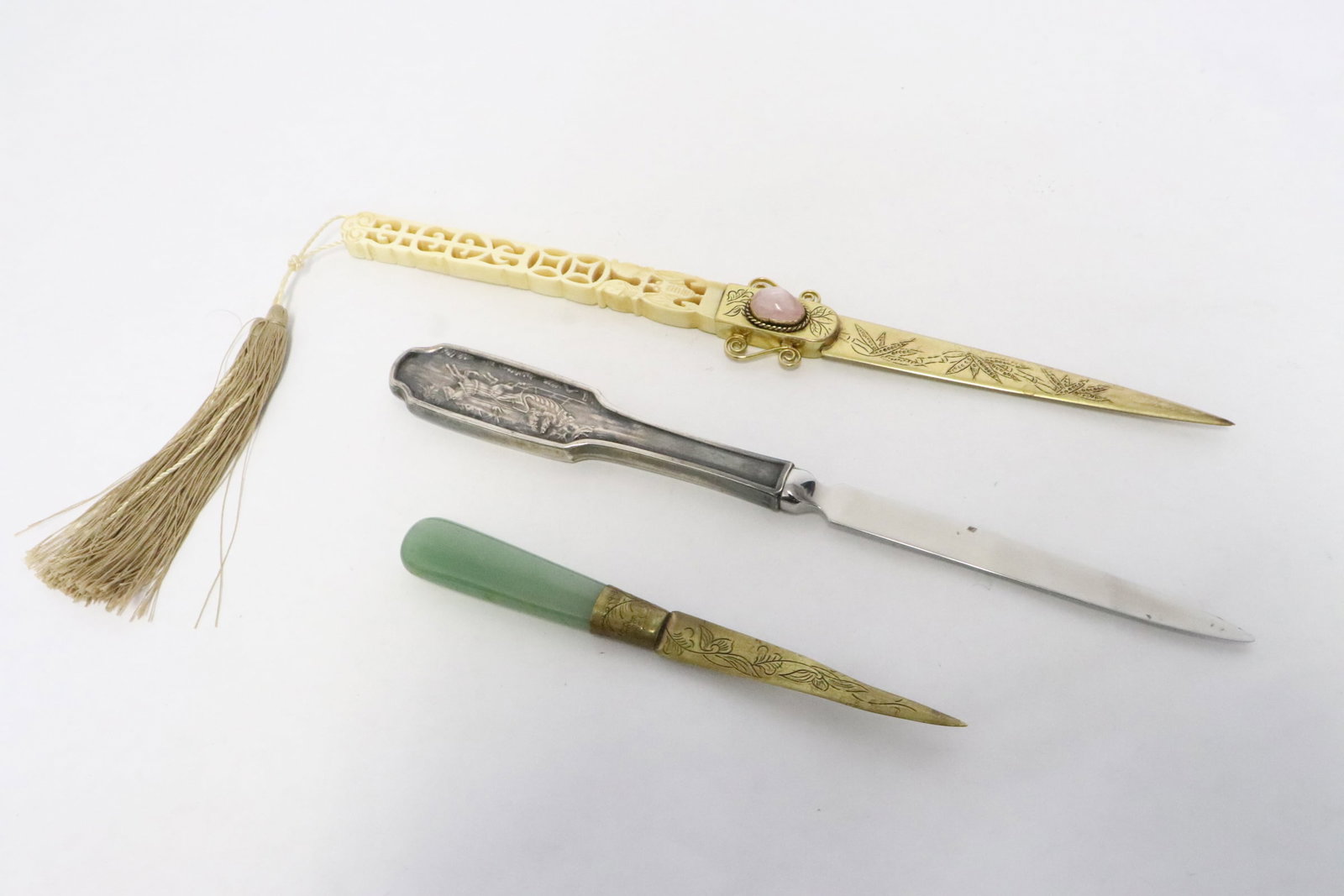 3 letter openers: 3 letter openers; a bone carved handle (9.4"L), a jade handle (4.2"L), and a silverplate handle (8.35"L)