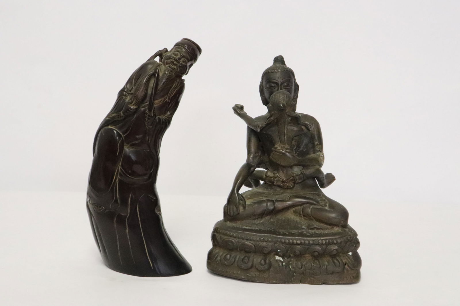 a bronze sculpture, & a horn carving (1 of 10)