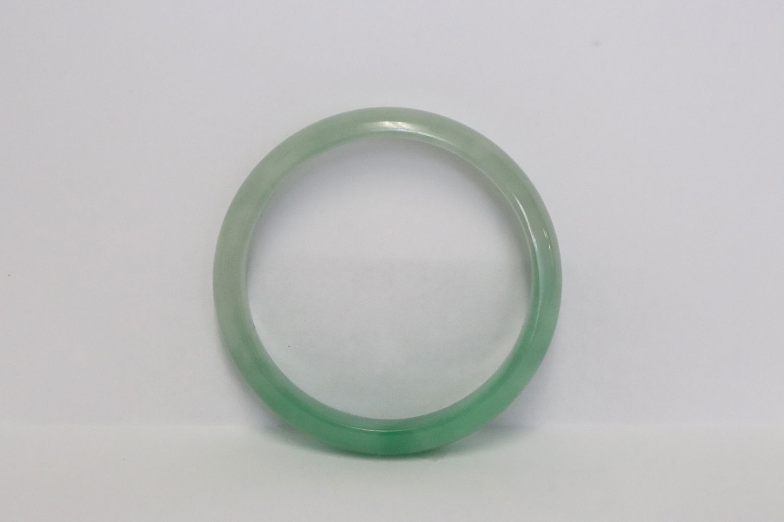 A jadeite bangle: A jadeite bangle, 0.45"x2.8"dia