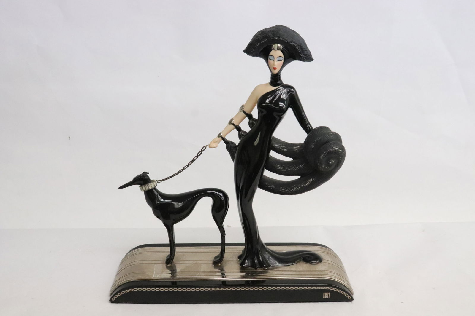 An Erte hand painted porcelain sculpture: An Erte hand painted porcelain sculpture "symphony in black" limited edition, 10.5"H