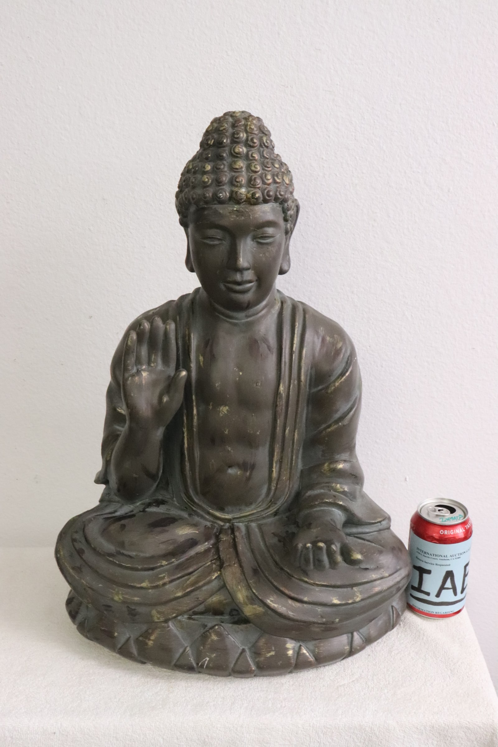 A large painted plaster Buddha, repair: A large painted plaster Buddha, repair, 21.15"H