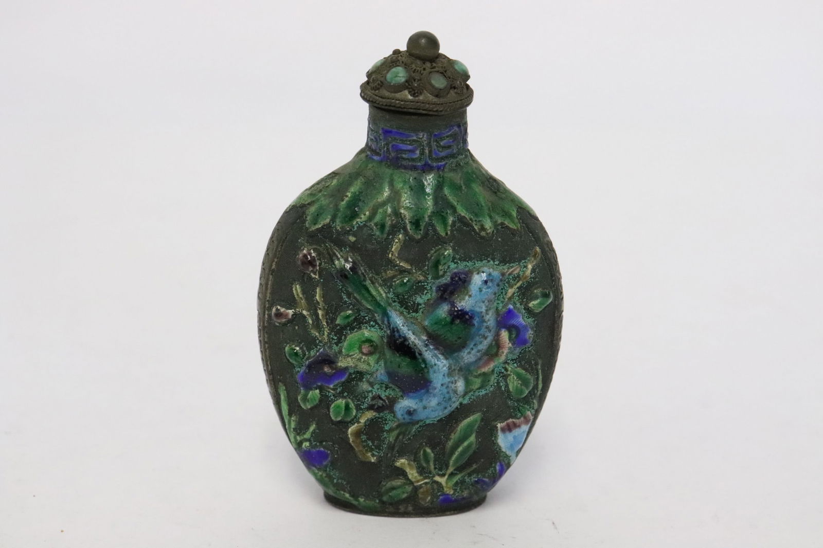 An enamel on white metal snuff bottle (1 of 6)