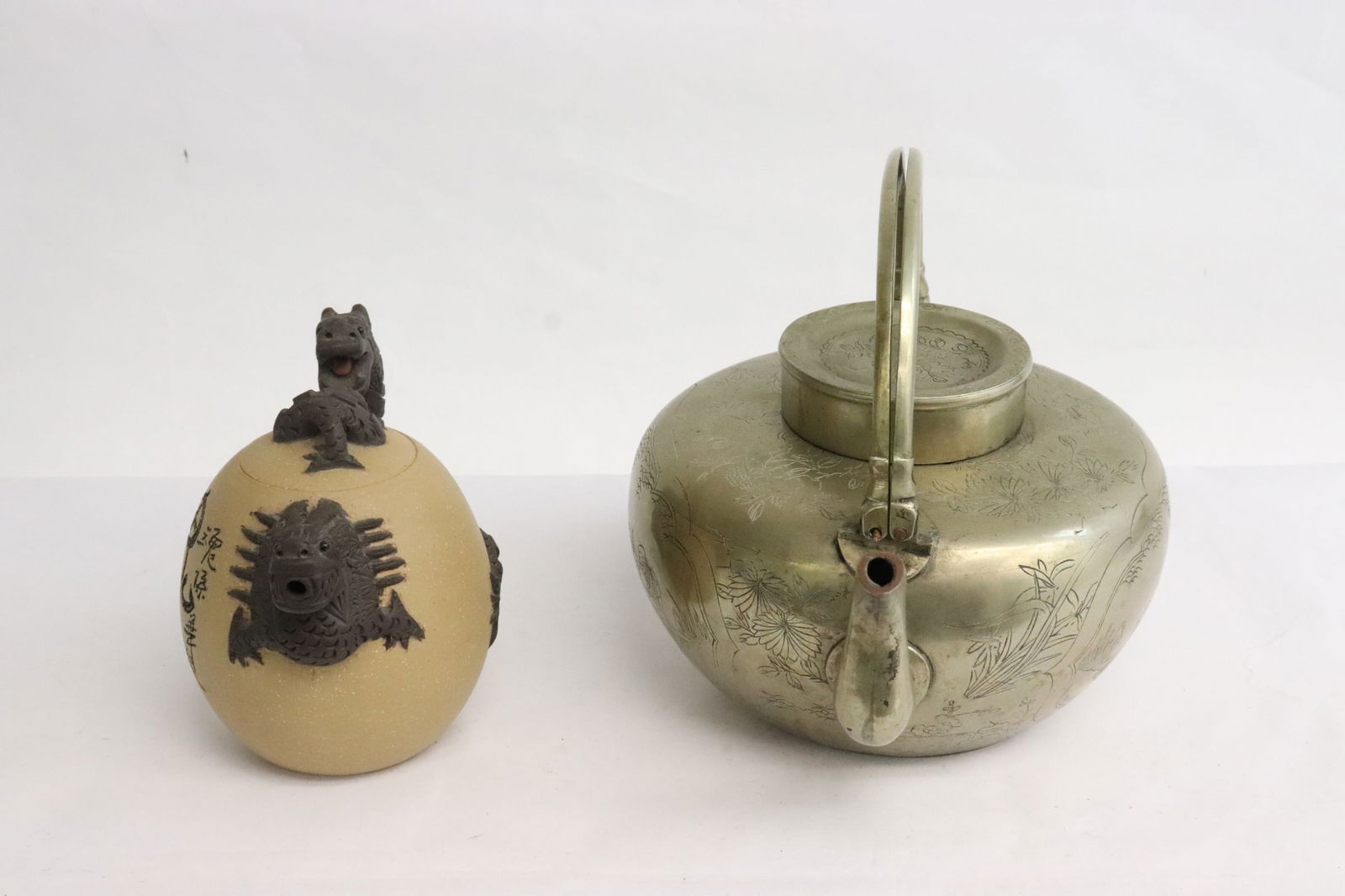 A 19th century tin teapot, and a Yixing teapot (1 of 11)