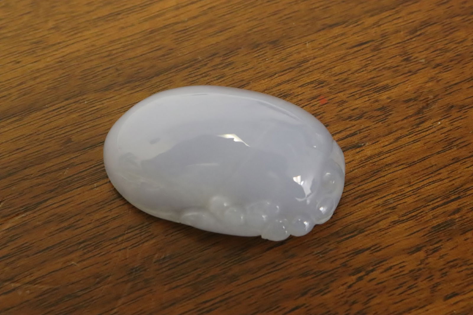 A lavender jadeite carved ornament: A lavender jadeite carved ornament (hairline), 0.65"x0.82"x1.2"