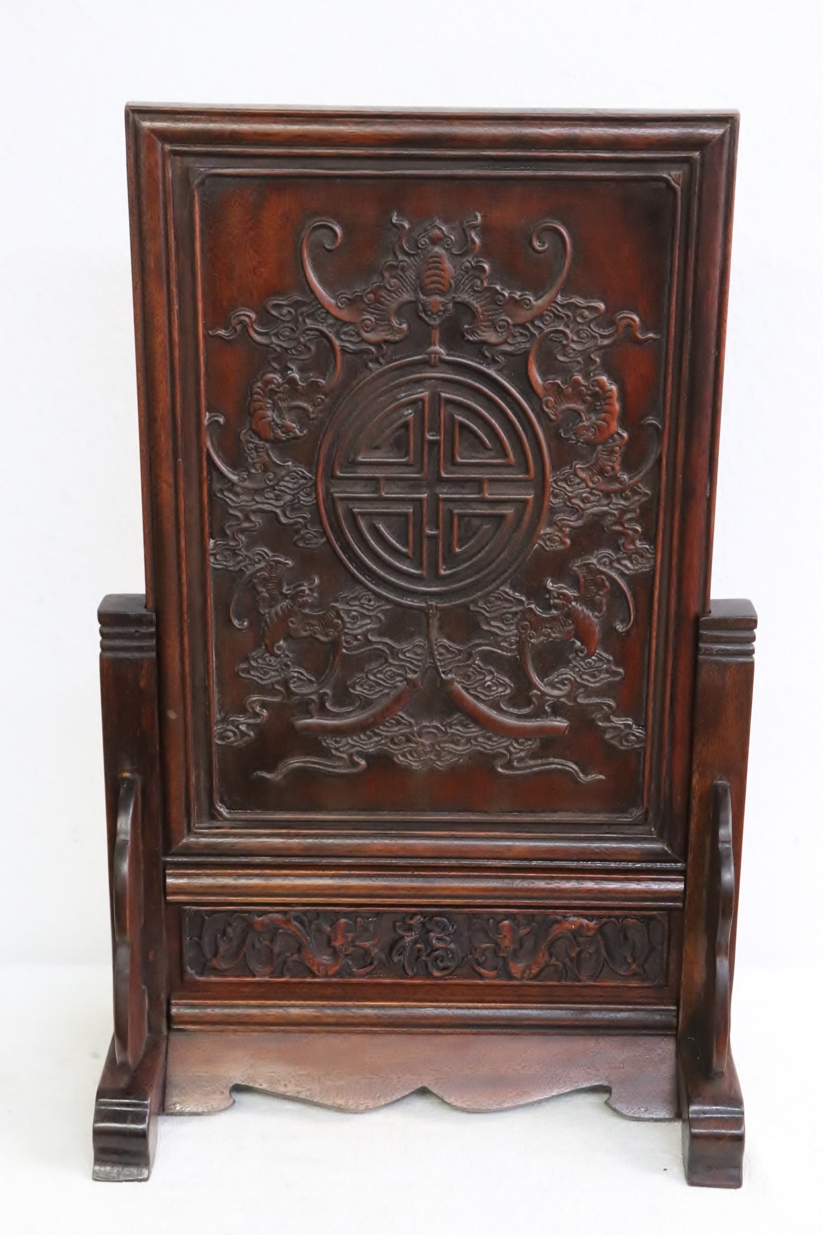 Chinese wood plaque on stand: Chinese wood plaque decorated with bat in relief on stand, 21.45"x13.4"x6.8"