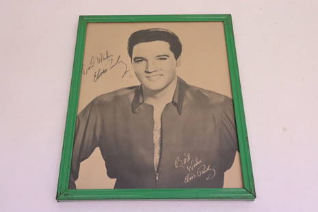 An Elvis Presley signed photo print: Most memorabilia in this auction from the property of Dave Berg. An Elvis Presley signed photo print, signature on top left, 9.3"x7.2"