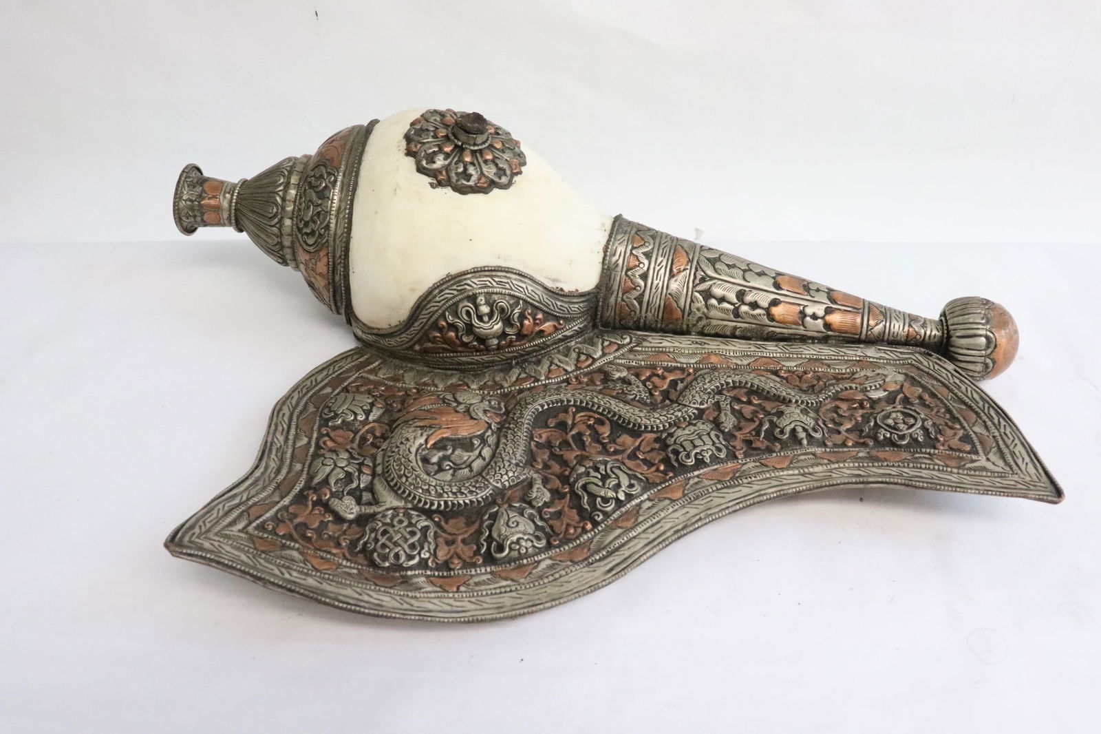 A vintage Tibetan conch shell w/ copper decoration (1 of 8)