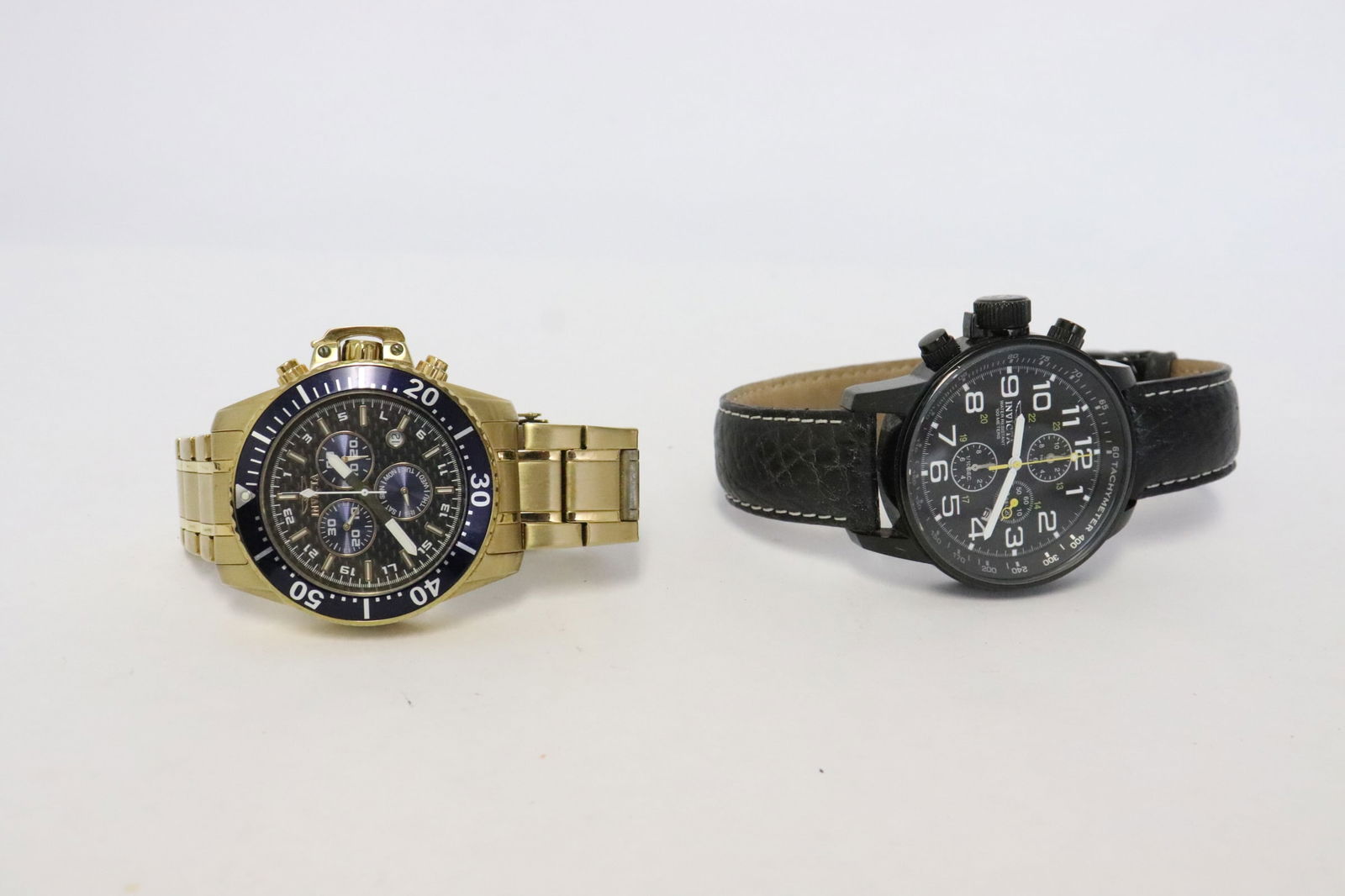 2 Invicta men's diver's watches: 2 Invicta men's diver's watches, condition unknown