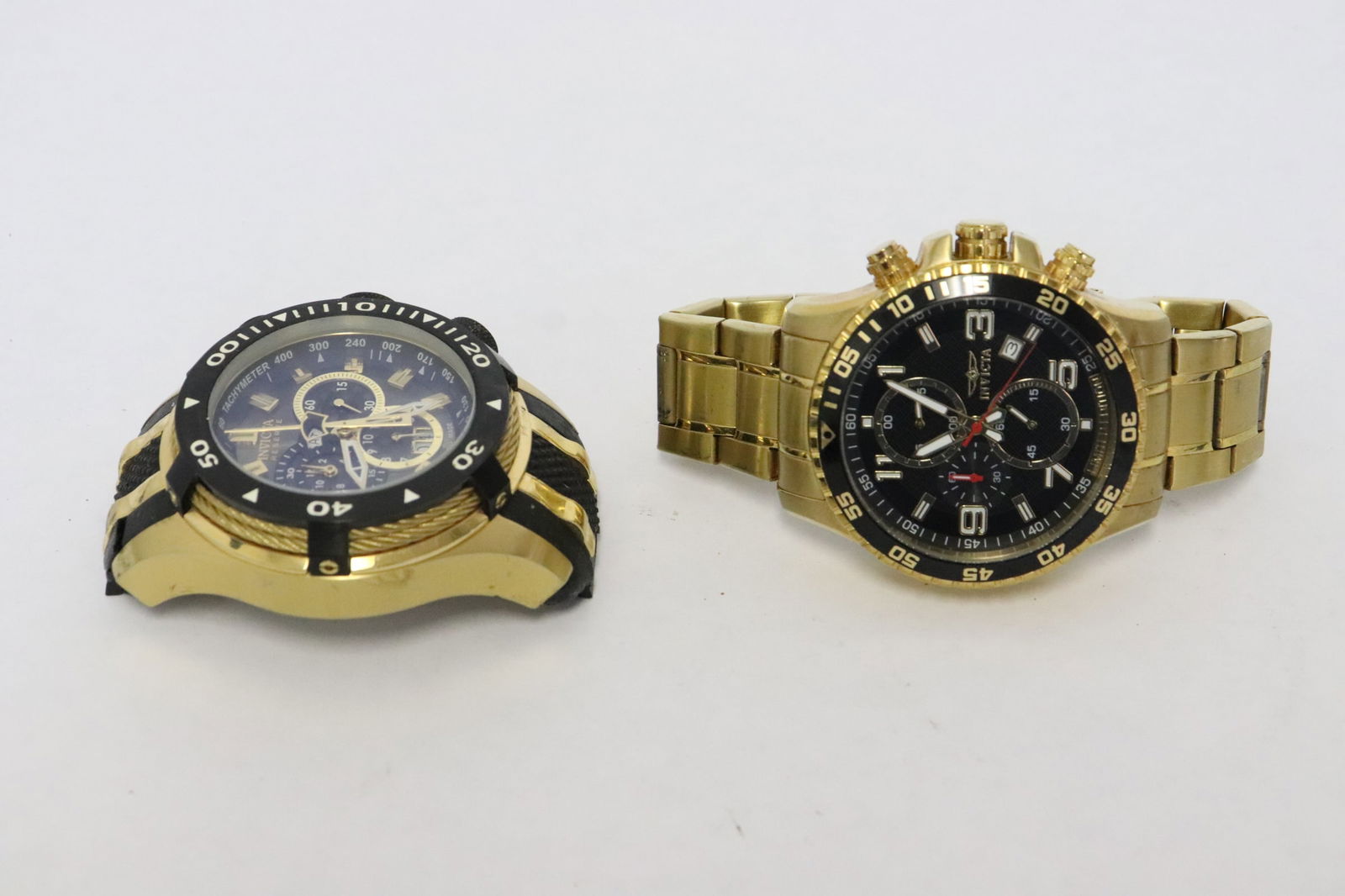 2 Invicta men's watches: 2 Invicta men's watches; a bolt reserve (need new band), and a limited edition, condition unknown