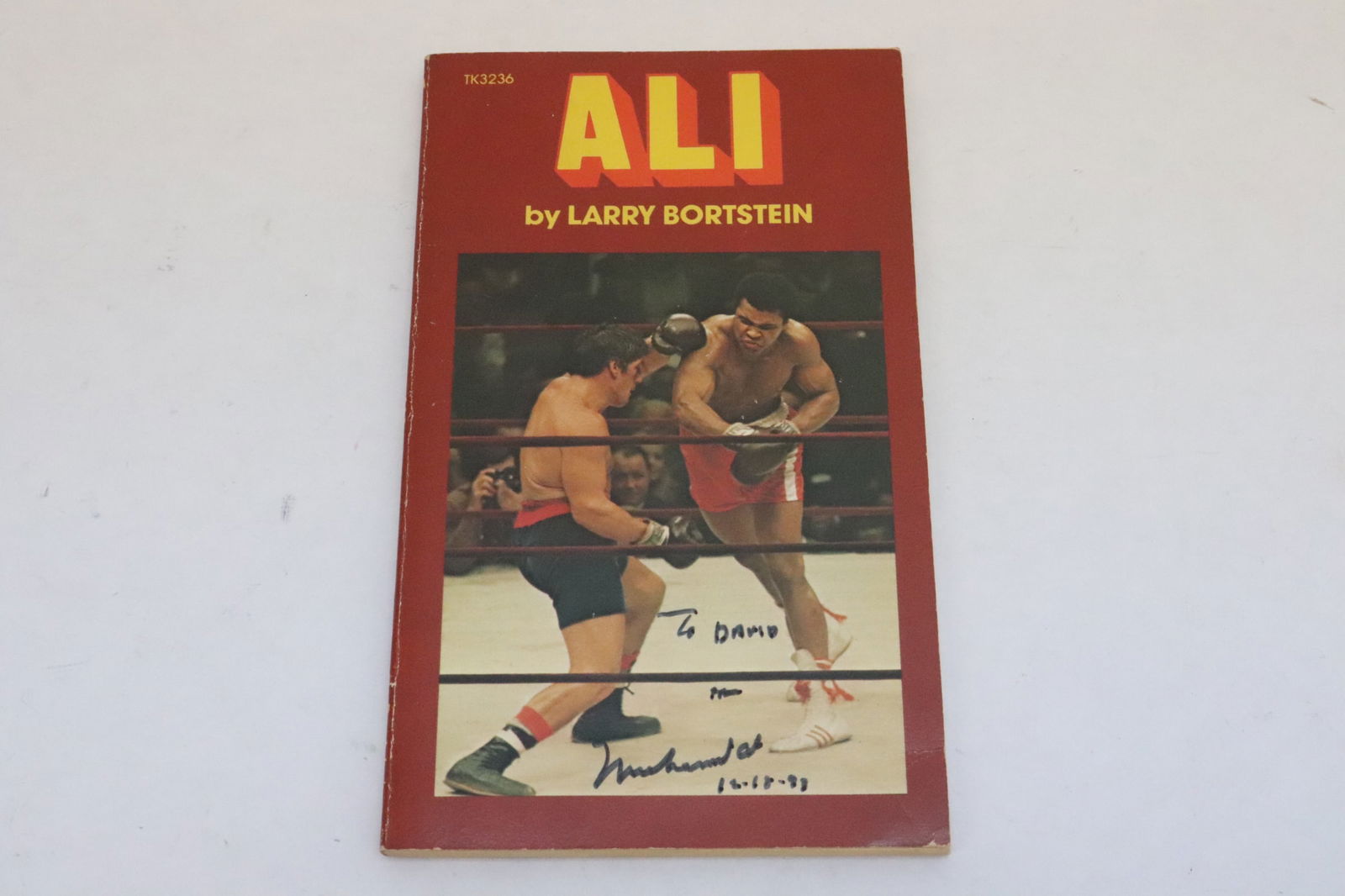 Muhammad Ali signed 1976 book by Larry Bortstein (1 of 9)