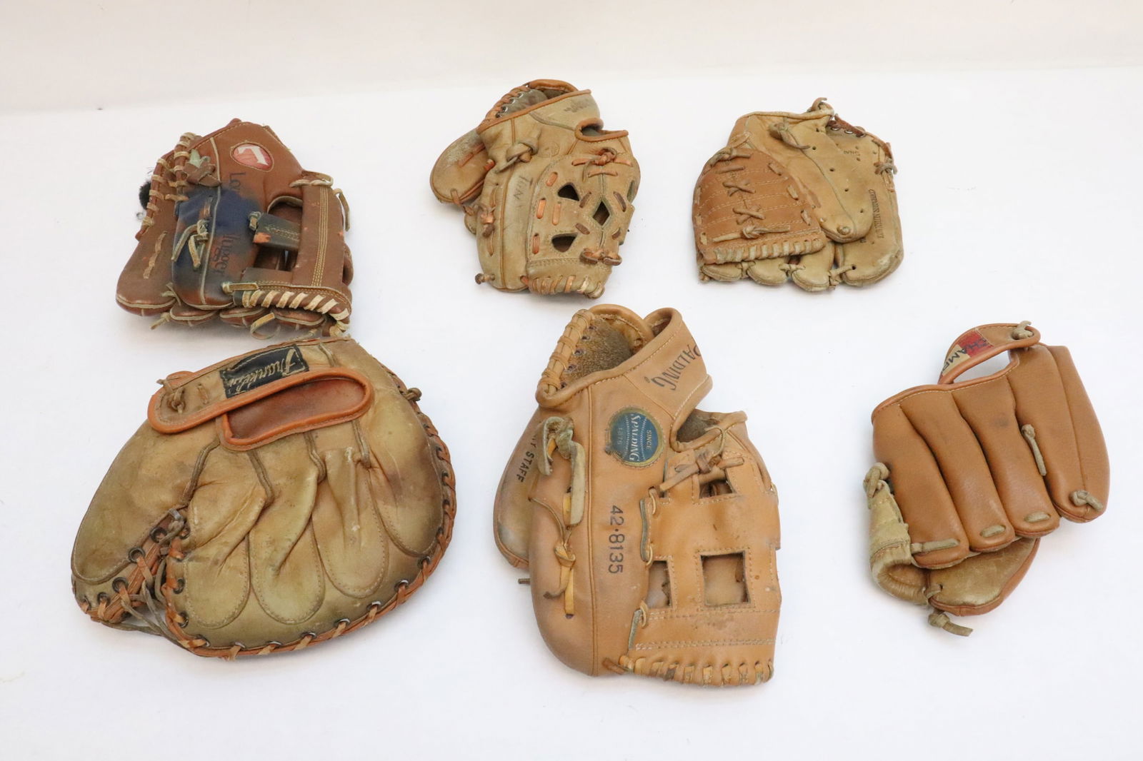 6 vintage baseball gloves (1 of 7)