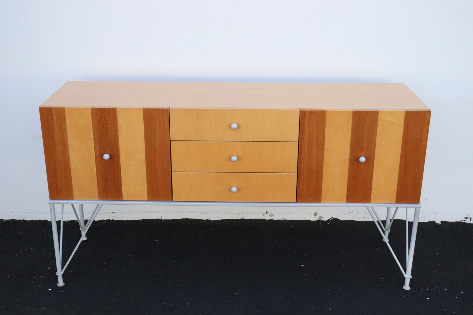 A modern design mixed wood side cabinet: A modern design mixed wood side cabinet with metal stand, 31.8"x60"x16.6"