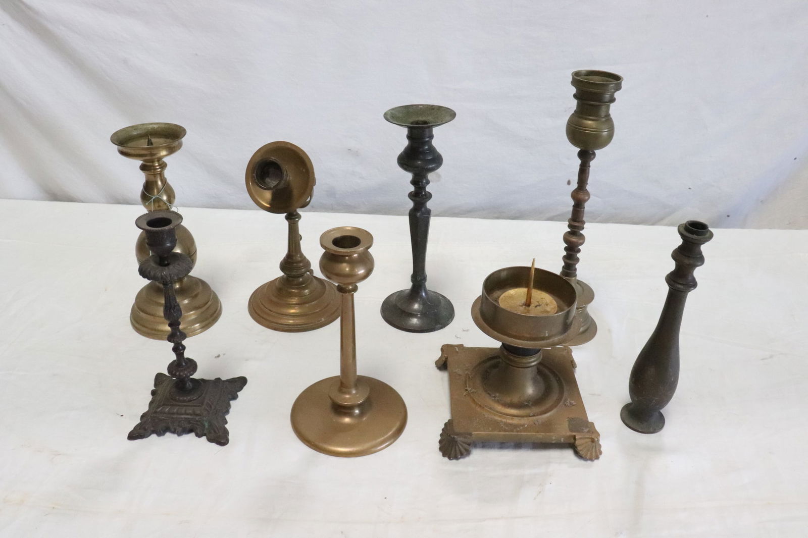 Lot of bronze, brass and other metal candle holders (1 of 9)