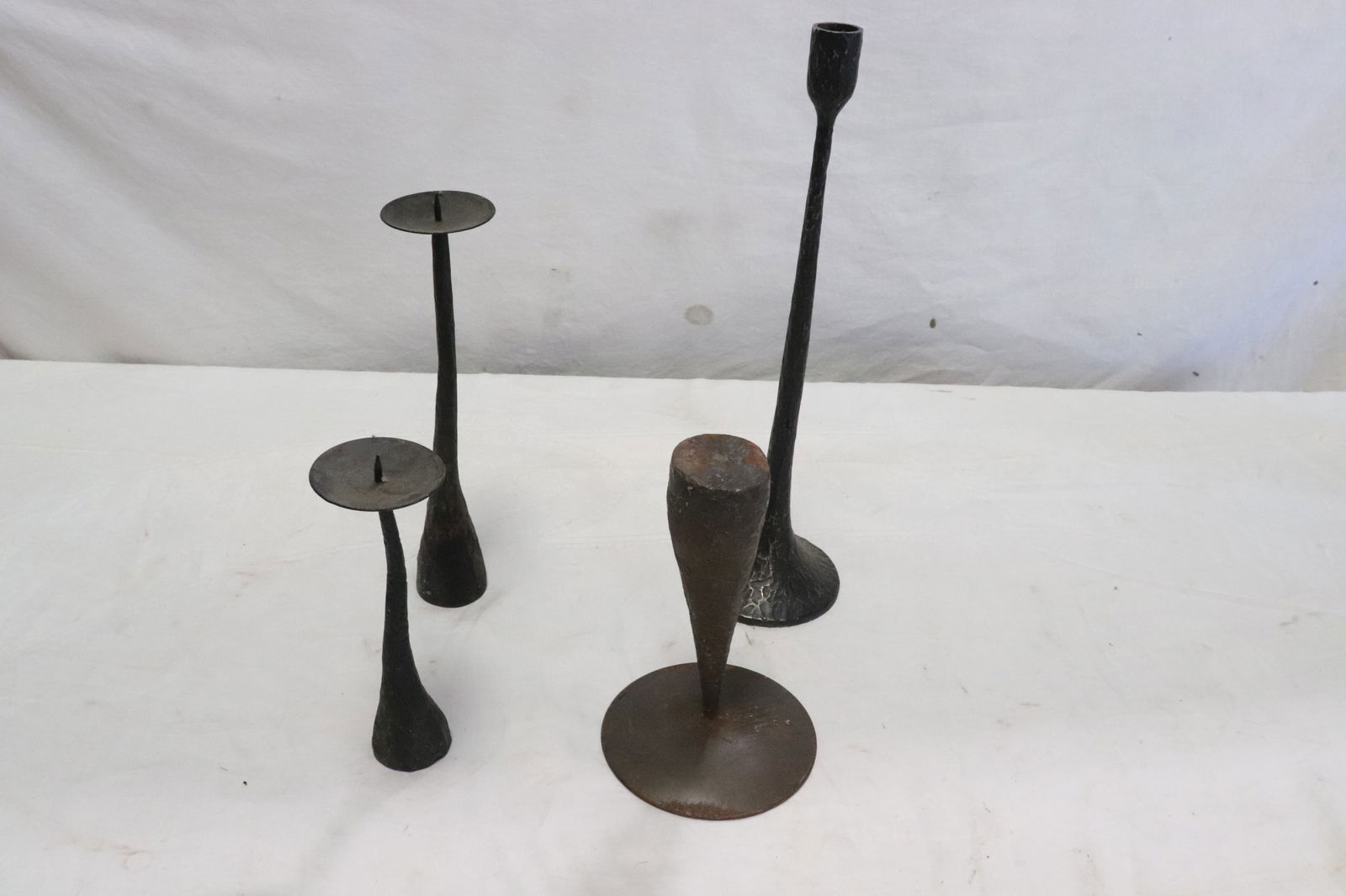 4 very heavy cast iron candle holders (1 of 8)