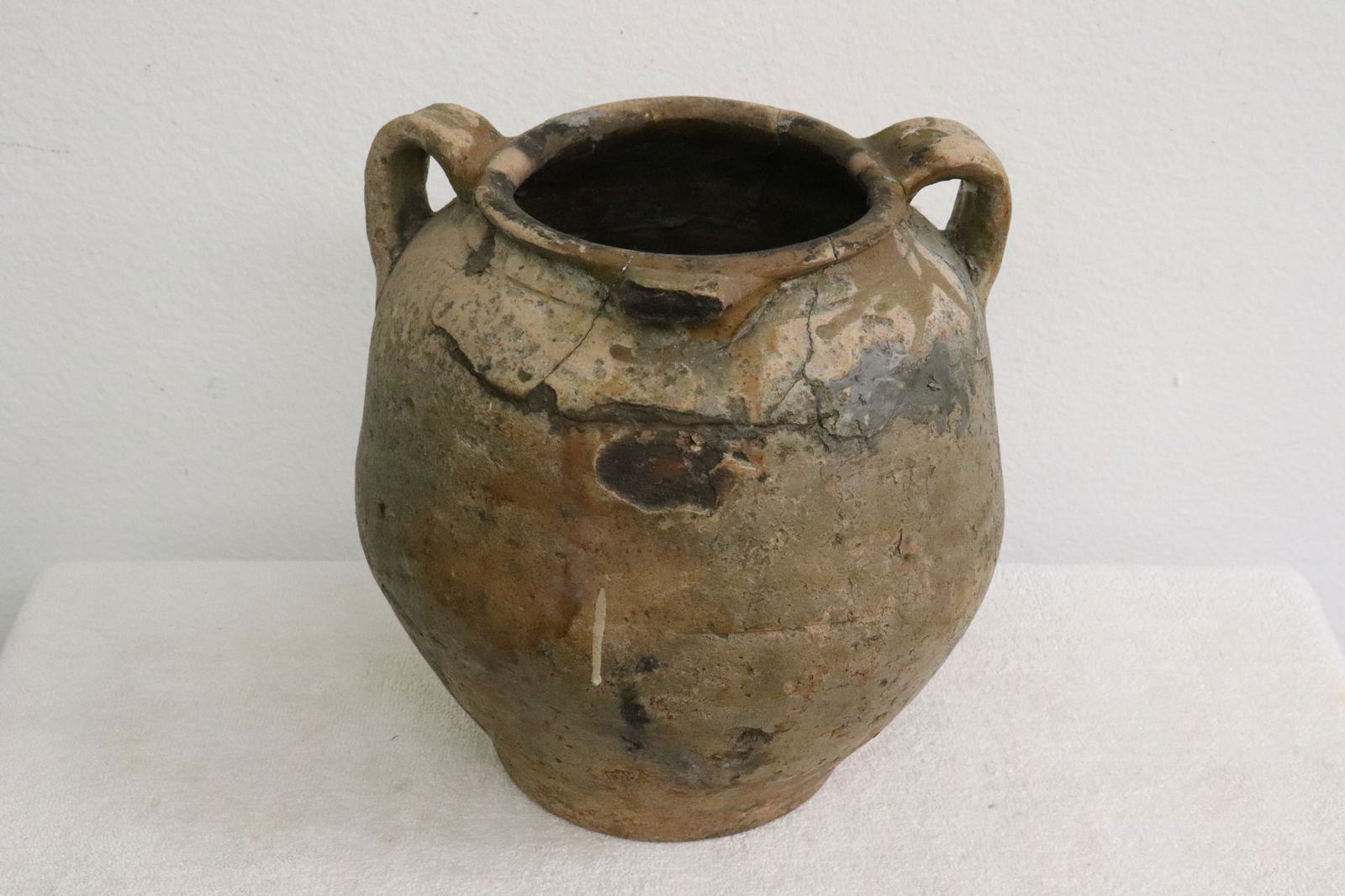Antique earthenware jar, damage and repair (1 of 9)