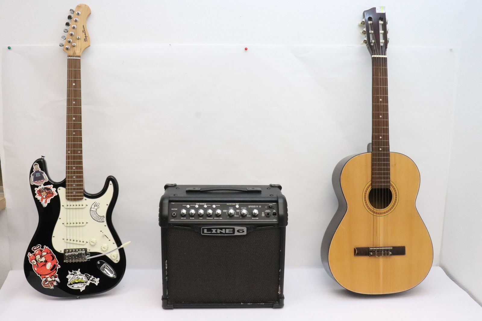 an acoustic guitar, an electric guitar, & an amplifier (1 of 12)