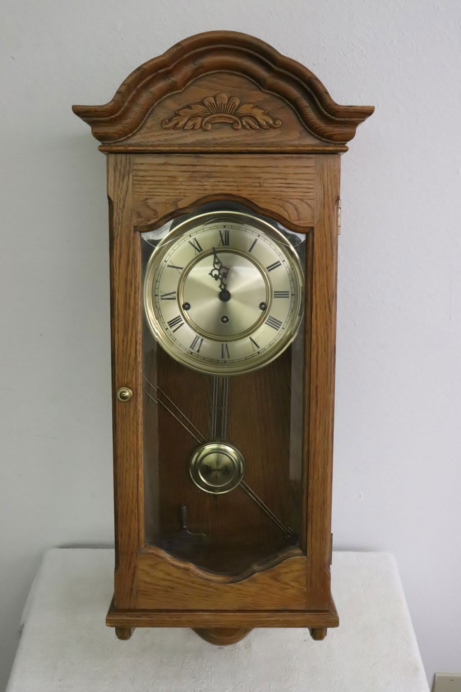 A vintage key wind wall clock with chime (1 of 9)