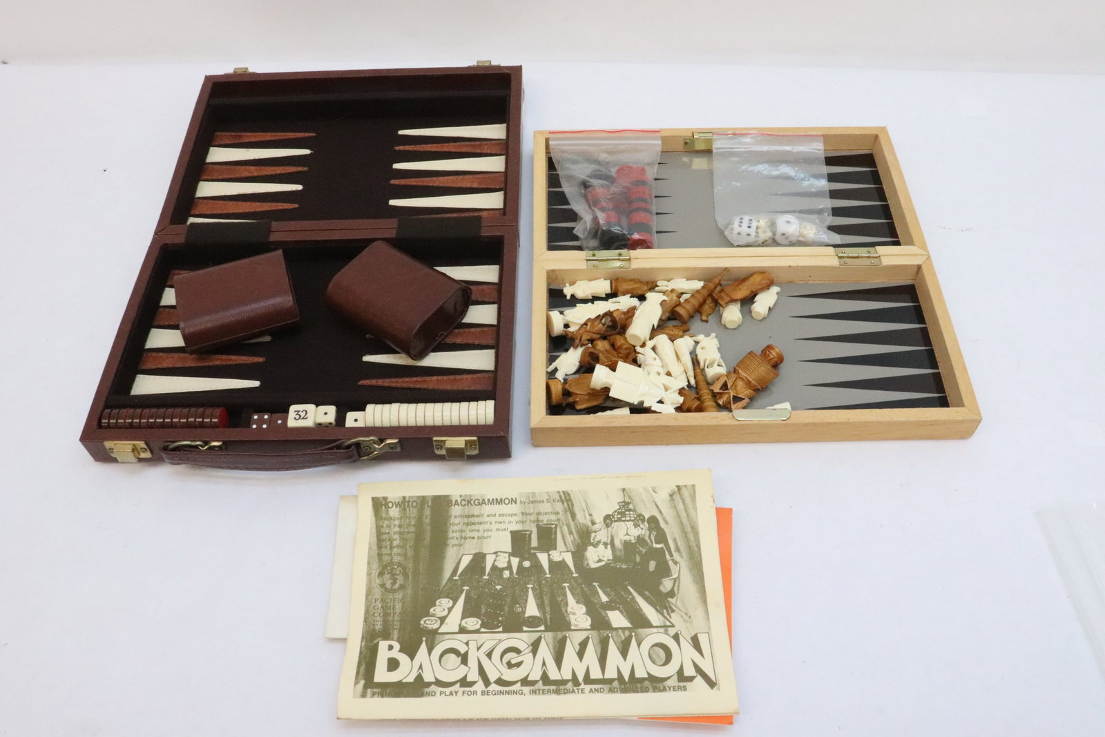 a chess set, and a backgammon set: 2 games; a chess set with bone carved pieces, and a backgammon set